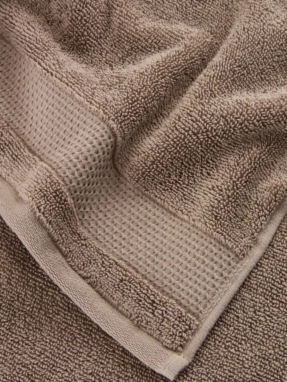 NORAGoldServiette de toilette NORA 50x100 sable foncé
